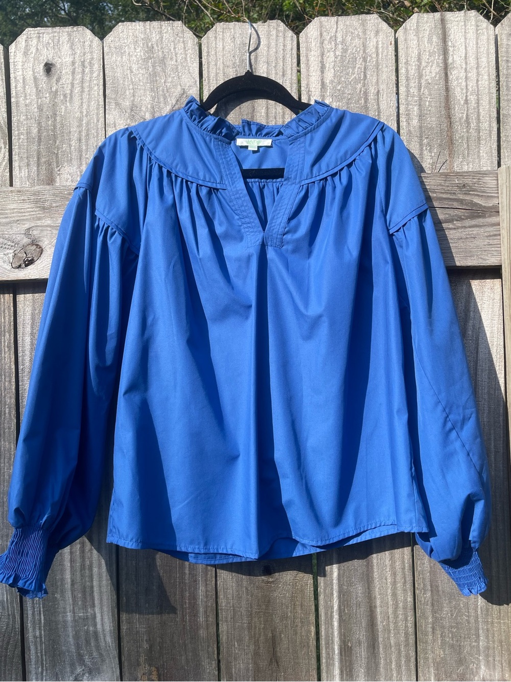 Relaxed Ruffle-Neck Blouse in Royal Blue